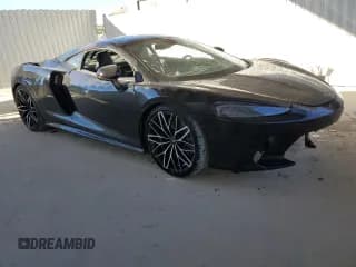 ✅ 2022 McLaren GT • VIN: SBM22GCA4NW001602 • Лот: 83270334. Опубликован ранее на Copart с пробегом 33 668 миль. Бесплатный доступ к архиву аукционных продаж из США и подробный отчёт об истории автомобиля на DreamBid. Изображение 4.
