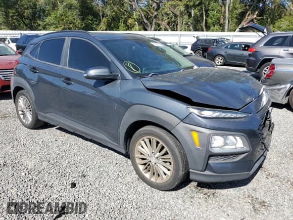 ✅ 2019 Hyundai Kona SEL • VIN: KM8K22AA0KU320397 • Лот: 73915733. Опубликован ранее на Copart с пробегом 65 864 миль. Бесплатный доступ к архиву аукционных продаж из США и подробный отчёт об истории автомобиля на DreamBid. Изображение 4.