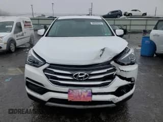 ✅ 2018 Hyundai Santa Fe 2.4L • VIN: 5XYZTDLB2JG563517 • Лот: 40059954. Опубликован ранее на Copart с пробегом 73 825 миль. Бесплатный доступ к архиву аукционных продаж из США и подробный отчёт об истории автомобиля на DreamBid. Изображение 5.