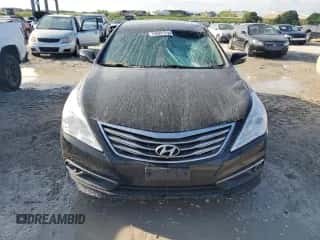 2016 Hyundai Azera z VIN KMHFG4JG8GA509598, wystawiony jako Copart lot #76098154 z przebiegiem 166 401 mil mil oraz Szkoda całkowita • Salvage title. Historia ofert i sprzedaży dostępna na DreamBid. Obrazek 5.