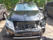 ✅ 2015 Nissan Pathfinder Platinum • VIN: 5N1AR2MM7FC707876 • Lot: 42255193. Listed on IAAI with 144,051 mi. Free auction sales archive from the USA and detailed vehicle history report at DreamBid. Image 13.