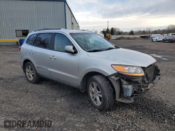 ✅ 2011 Hyundai Santa Fe Limited • VIN: 5XYZHDAG0BG016716 • Lot: 87739595. Listed on Copart with 188,839 mi. Free auction sales archive from the USA and detailed vehicle history report at DreamBid. Image 4.