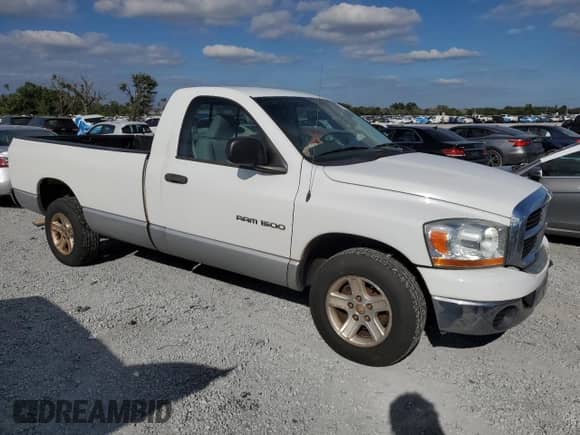 2006 Dodge 1500 SLT with VIN 1D7HA16N16J167310, listed as a Copart auction lot 90030015 with 162,169 mi miles and Salvage title. Bid and sale history available at DreamBid. Image 4.
