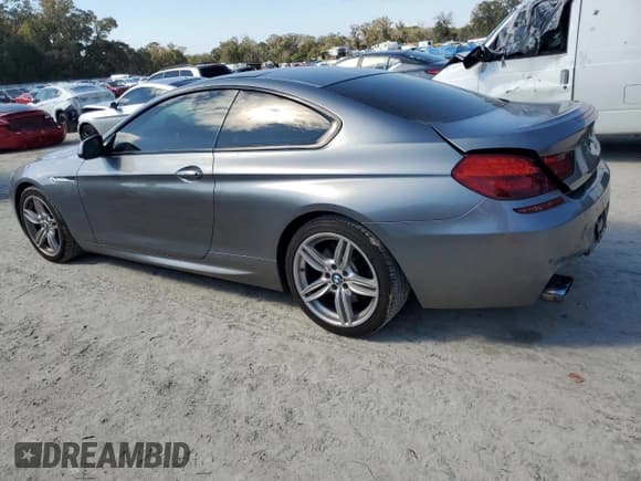 ✅ 2013 BMW 6 Series 650i • VIN: WBAYM9C57DDW20035 • Лот: 47051175. Опубликован ранее на Copart с пробегом 96 315 миль. Бесплатный доступ к архиву аукционных продаж из США и подробный отчёт об истории автомобиля на DreamBid. Изображение 2.