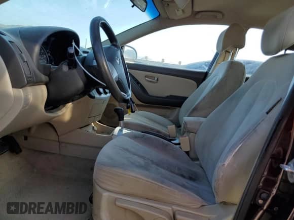 2007 Hyundai Elantra GLS z VIN KMHDU46DX7U263473, wystawiony jako Copart lot #75983114 z przebiegiem 259 976 mil mil oraz Szkoda całkowita • Salvage title. Historia ofert i sprzedaży dostępna na DreamBid. Obrazek 7.