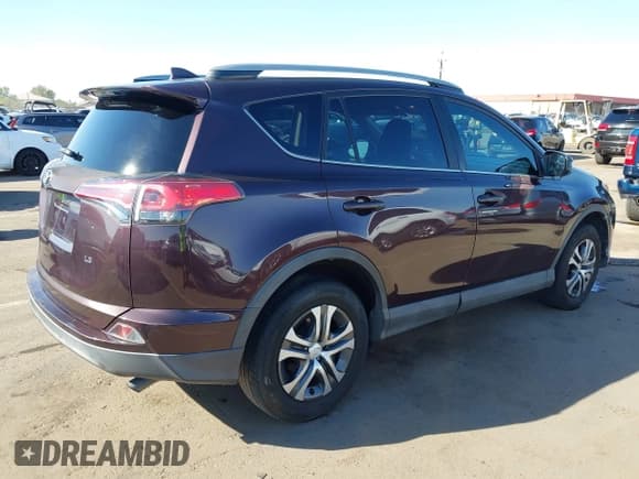 ✅ 2018 Toyota RAV4 LE • VIN: 2T3ZFREV2JW513326 • Lot: 43642263. Listed on IAAI with 72,790 mi. Free auction sales archive from the USA and detailed vehicle history report at DreamBid. Image 4.