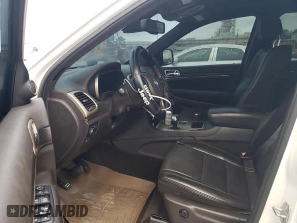 ✅ 2015 Jeep Grand Cherokee Summit • VIN: 1C4RJEJG8FC131925 • Lot: 55270785. Listed on Copart with 130,425 mi. Free auction sales archive from the USA and detailed vehicle history report at DreamBid. Image 7.