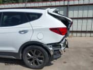 ✅ 2017 Hyundai Santa Fe Ultimate • VIN: 5NMZW4LA1HH042352 • Lot: 42753102. Listed on IAAI with 86,473 mi. Free auction sales archive from the USA and detailed vehicle history report at DreamBid. Image 19.