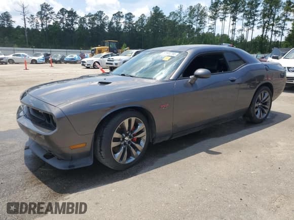 ✅ 2014 Dodge Challenger SRT-8 • VIN: 2C3CDYCJ1EH100216 • Lot: 57844795. Wystawiony na Copart z przebiegiem Nie podano. Bezpłatny archiwum sprzedaży aukcyjnych z USA i szczegółowy raport historii pojazdu na DreamBid. Zdjęcie 1.