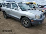 ✅ 2004 Hyundai Santa Fe GLS • VIN: KM8SC13D74U737002 • Lot: 51987865. Listed on Copart with 163,493 mi. Free auction sales archive from the USA and detailed vehicle history report at DreamBid. Image 4.