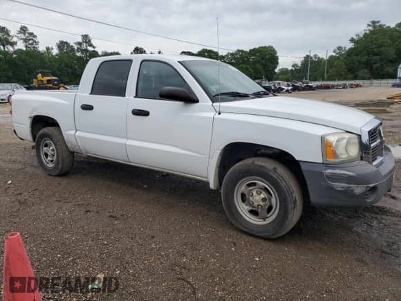 2007 Dodge Dakota ST с VIN 1D7HE28K37S200672, выставлен на аукционе Copart как лот 52682114 с пробегом 135 041 миль миль и Списание • Salvage title. История ставок и продаж доступна на DreamBid. Изображение 4.