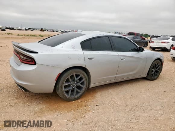 ✅ 2023 Dodge Charger SXT • VIN: 2C3CDXBG4PH623135 • Lot: 58100155. Listed on Copart with 8,964 mi. Free auction sales archive from the USA and detailed vehicle history report at DreamBid. Image 3.