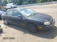 ✅ 1999 Mercury Sable GS • VIN: 1MEFM50U3XG629539 • Lot: 66442905. Listed on Copart with 52,210 mi. Free auction sales archive from the USA and detailed vehicle history report at DreamBid. Image 4.