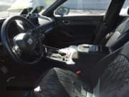 ✅ 2025 Honda Civic Sport • VIN: 2HGFE2F5XSH539221 • Lot: 43325621. Listed on IAAI with 11,878 mi. Free auction sales archive from the USA and detailed vehicle history report at DreamBid. Image 17.