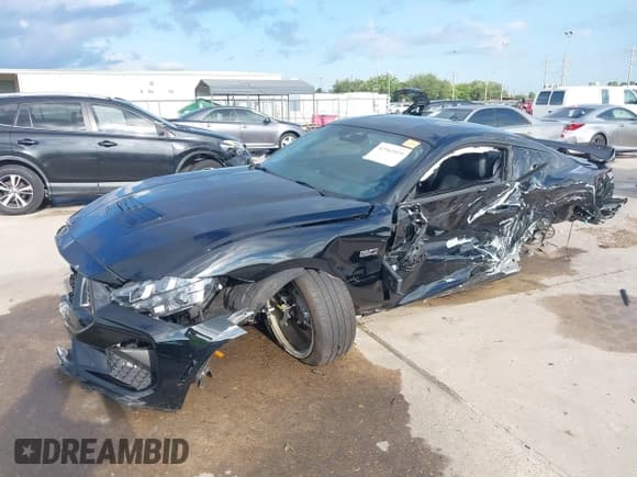 ✅ 2024 Ford Mustang GT Premium • VIN: 1FA6P8CFXR5400464 • Lot: 42961039. Listed on IAAI with 5,368 mi. Free auction sales archive from the USA and detailed vehicle history report at DreamBid. Image 2.