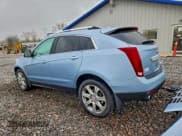 ✅ 2013 Cadillac SRX Performance Collection • VIN: 3GYFNHE35DS646091 • Lot: 93965765. Listed on Copart with 181,809 mi. Free auction sales archive from the USA and detailed vehicle history report at DreamBid. Image 2.