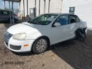 ✅ 2009 Volkswagen Jetta S • VIN: 3VWJM71K09M091585 • Lot: 43140304. Listed on IAAI with 239,628 mi. Free auction sales archive from the USA and detailed vehicle history report at DreamBid. Image 2.