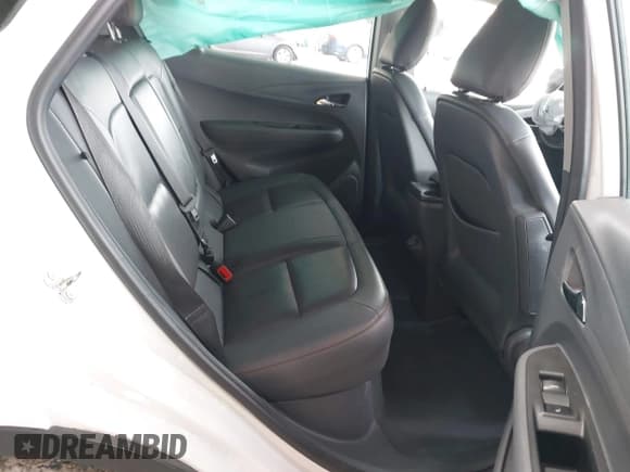 ✅ 2019 Chevrolet Bolt EV Premier • VIN: 1G1FZ6S03K4101117 • Lot: 41906677. Listed on IAAI with 104,800 mi. Free auction sales archive from the USA and detailed vehicle history report at DreamBid. Image 8.