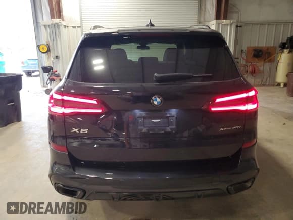 ✅ 2023 BMW X5 xDrive40i • VIN: 5UXCR6C06P9R96829 • Лот: 87280715. Опубликован ранее на Copart с пробегом 40 779 миль. Бесплатный доступ к архиву аукционных продаж из США и подробный отчёт об истории автомобиля на DreamBid. Изображение 6.