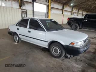 ✅ 1992 Toyota Corolla • VIN: 1NXAE91A6NZ330349 • Lot: 50472445. Listed on Copart with 218,525 mi. Free auction sales archive from the USA and detailed vehicle history report at DreamBid. Image 4.
