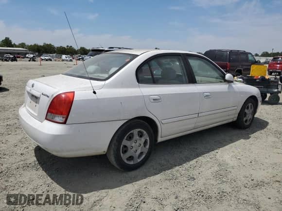 2003 Hyundai Elantra GLS with VIN KMHDN45D63U595788, listed as a Copart auction lot 59692984 with 119,573 mi miles and Salvage title. Bid and sale history available at DreamBid. Image 3.