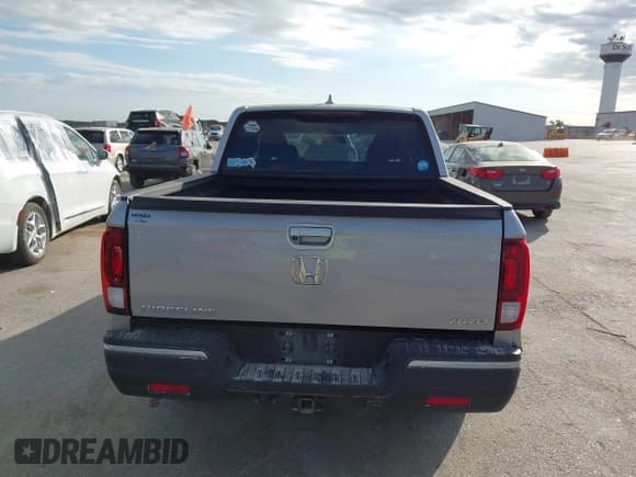 ✅ 2017 Honda Ridgeline RTL-T • VIN: 5FPYK3F60HB018044 • Lot: 43374137. Listed on IAAI with 115,043 mi. Free auction sales archive from the USA and detailed vehicle history report at DreamBid. Image 22.