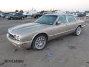 ✅ 2003 Jaguar XJ 8 • VIN: SAJDA14C23LF53538 • Lot: 43497903. Wystawiony na IAAI z przebiegiem 119 873 mil. Bezpłatny archiwum sprzedaży aukcyjnych z USA i szczegółowy raport historii pojazdu na DreamBid. Zdjęcie 2.