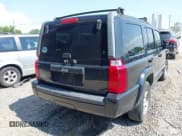 ✅ 2010 Jeep Commander Sport • VIN: 1J4RG4GK0AC157281 • Lot: 42581215. Listed on IAAI with 202,014 mi. Free auction sales archive from the USA and detailed vehicle history report at DreamBid. Image 4.