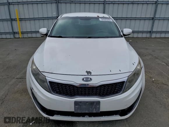 ✅ 2012 Kia Optima LX • VIN: 5XXGM4A79CG029229 • Лот: 94503205. Опубликован ранее на Copart с пробегом 307 303 миль. Бесплатный доступ к архиву аукционных продаж из США и подробный отчёт об истории автомобиля на DreamBid. Изображение 5.