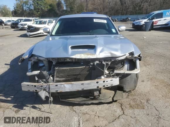 2009 Dodge Charger SRT-8 с VIN 2B3LA73W09H610039, выставлен на аукционе Copart как лот 86885314 с пробегом Не указан миль и Списание • Salvage title. История ставок и продаж доступна на DreamBid. Изображение 5.