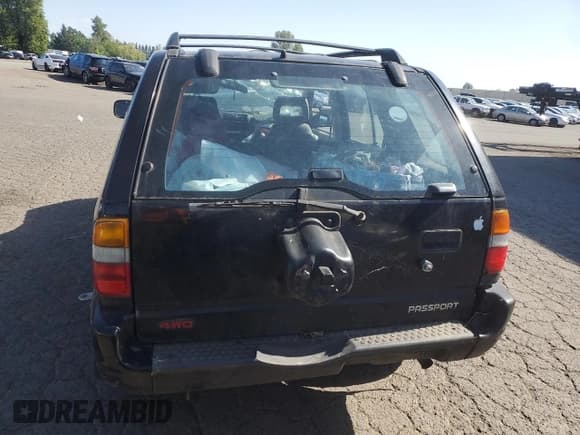 ✅ 1998 Honda Passport LX • VIN: 4S6CM58WXW4417444 • Lot: 55157355. Listed on Copart with Not provided. Free auction sales archive from the USA and detailed vehicle history report at DreamBid. Image 6.