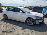 ✅ 2017 Ford Fusion Hybrid Titanium • VIN: 3FA6P0RU8HR266217 • Lot: 70721505. Wystawiony na Copart z przebiegiem 126 546 mil. Bezpłatny archiwum sprzedaży aukcyjnych z USA i szczegółowy raport historii pojazdu na DreamBid. Zdjęcie 4.