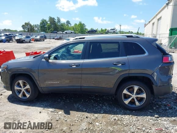 ✅ 2020 Jeep Cherokee Limited • VIN: 1C4PJMDX0LD519038 • Lot: 42289772. Listed on IAAI with 94,079 mi. Free auction sales archive from the USA and detailed vehicle history report at DreamBid. Image 14.