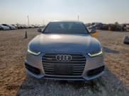 ✅ 2016 Audi A6 Prestige • VIN: WAUHGAFCXGN060769 • Лот: 81151315. Опубликован ранее на Copart с пробегом 120 790 миль. Бесплатный доступ к архиву аукционных продаж из США и подробный отчёт об истории автомобиля на DreamBid. Изображение 5.