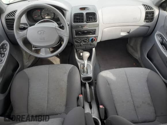 2004 Hyundai Accent GL с VIN KMHCG45C14U540938, выставлен на аукционе Copart как лот 46701935 с пробегом 71 891 миль миль и Списание • Salvage title. История ставок и продаж доступна на DreamBid. Изображение 8.
