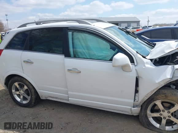 ✅ 2013 Chevrolet Captiva Sport LT • VIN: 3GNAL3EKXDS613580 • Lot: 42024623. Wystawiony na IAAI z przebiegiem 81 787 mil. Bezpłatny archiwum sprzedaży aukcyjnych z USA i szczegółowy raport historii pojazdu na DreamBid. Zdjęcie 13.