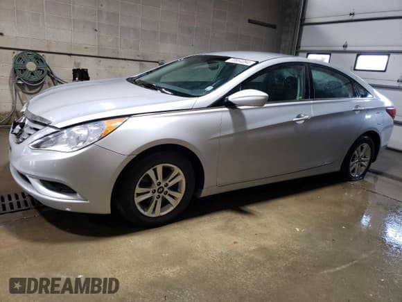 ✅ 2013 Hyundai Sonata GLS • VIN: 5NPEB4AC8DH746544 • Lot: 70664094. Listed on Copart with 82,194 mi. Free auction sales archive from the USA and detailed vehicle history report at DreamBid. Image 1.