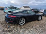 ✅ 2017 Porsche 911 Carrera • VIN: WP0AA2A96HS107967 • Lot: 48043775. Listed on Copart with 57,235 mi. Free auction sales archive from the USA and detailed vehicle history report at DreamBid. Image 3.