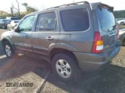 ✅ 2003 Mazda Tribute LX • VIN: 4F2CZ94133KM52401 • Лот: 42142297. Опубликован ранее на IAAI с пробегом Не указан. Бесплатный доступ к архиву аукционных продаж из США и подробный отчёт об истории автомобиля на DreamBid. Изображение 3.