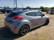 2016 Hyundai Veloster z VIN KMHTC6AD7GU248608, wystawiony jako Copart lot #65809693 z przebiegiem 104 784 mil mil oraz . Historia ofert i sprzedaży dostępna na DreamBid. Obrazek 3.