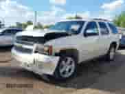 2013 Chevrolet Tahoe LTZ with VIN 1GNSCCE09DR357731, listed as a IAAI auction lot 43343449 with 148,667 mi miles and . Bid and sale history available at DreamBid. Image 19.