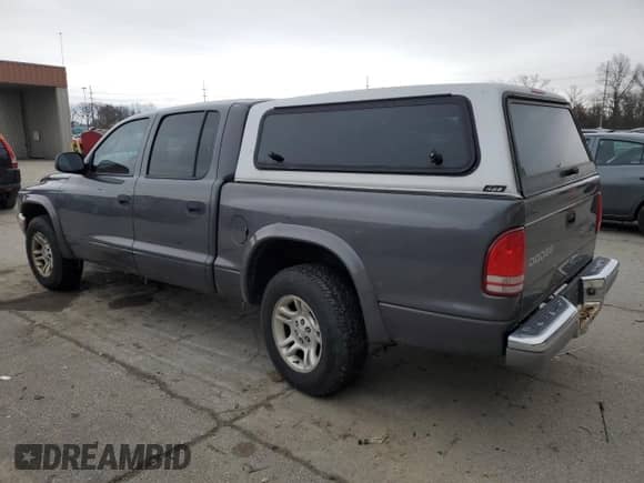 2004 Dodge Dakota SLT with VIN 1D7HL48K64S711774, listed as a Copart auction lot 84385994 with 253,318 mi miles and Clean title. Bid and sale history available at DreamBid. Image 2.