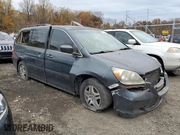 ✅ 2005 Honda Odyssey EX-L • VIN: 5FNRL387X5B030925 • Lot: 90839255. Listed on Copart with 163,476 mi. Free auction sales archive from the USA and detailed vehicle history report at DreamBid. Image 4.