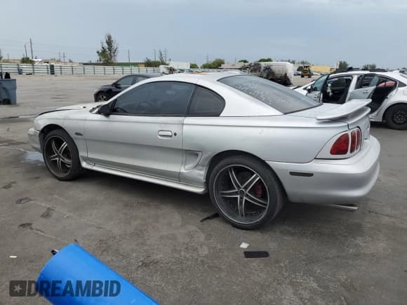 ✅ 1998 Ford Mustang GT • VIN: 1FAFP42XXWF229613 • Lot: 63231905. Listed on Copart with 65,669 mi. Free auction sales archive from the USA and detailed vehicle history report at DreamBid. Image 2.