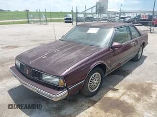 ✅ 1987 Oldsmobile Delta • VIN: 1G3HY1437HW365774 • Лот: 42576150. Опубликован ранее на IAAI с пробегом 68 878 миль. Бесплатный доступ к архиву аукционных продаж из США и подробный отчёт об истории автомобиля на DreamBid. Изображение 2.
