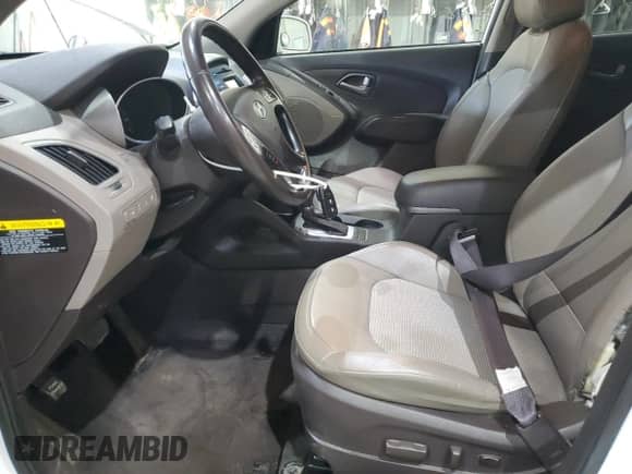 2014 Hyundai Tucson Limited with VIN KM8JUCAG2EU806309, listed as a Copart auction lot 66015735 with 104,328 mi miles and Salvage title. Bid and sale history available at DreamBid. Image 7.