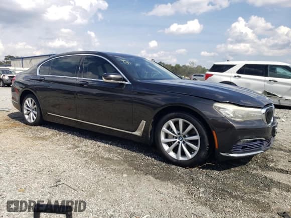 ✅ 2016 BMW 7 Series 740i • VIN: WBA7E2C56GG504506 • Лот: 81659585. Опубликован ранее на Copart с пробегом 93 842 миль. Бесплатный доступ к архиву аукционных продаж из США и подробный отчёт об истории автомобиля на DreamBid. Изображение 4.