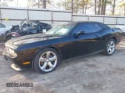 ✅ 2014 Dodge Challenger SXT • VIN: 2C3CDYAG6EH187148 • Lot: 41272492. Wystawiony na IAAI z przebiegiem 168 225 mil. Bezpłatny archiwum sprzedaży aukcyjnych z USA i szczegółowy raport historii pojazdu na DreamBid. Zdjęcie 17.