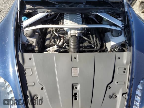 ✅ 2008 Aston Martin Vantage • VIN: SCFBF04B98GD08245 • Лот: 60154265. Опубликован ранее на Copart с пробегом 63 436 миль. Бесплатный доступ к архиву аукционных продаж из США и подробный отчёт об истории автомобиля на DreamBid. Изображение 11.