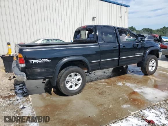 ✅ 2002 Toyota Tundra Limited • VIN: 5TBRT38122S231424 • Lot: 60461355. Listed on Copart with 176,800 mi. Free auction sales archive from the USA and detailed vehicle history report at DreamBid. Image 3.
